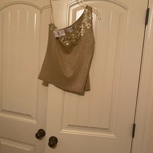 Gold one shoulder top with florettes and pearls.